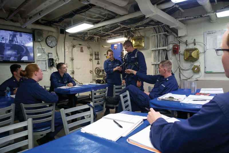 A crew in a meeting hall