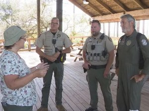 DeNell with FWC officers